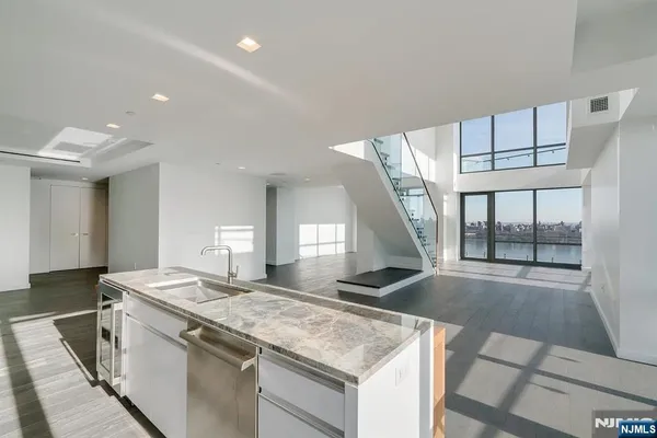 a kitchen with a stove and a sink