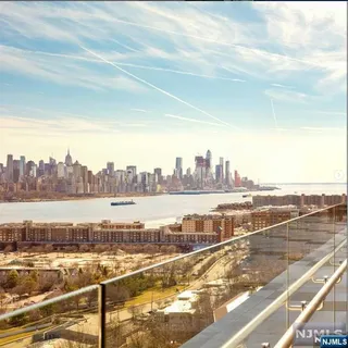 a view of an ocean and city