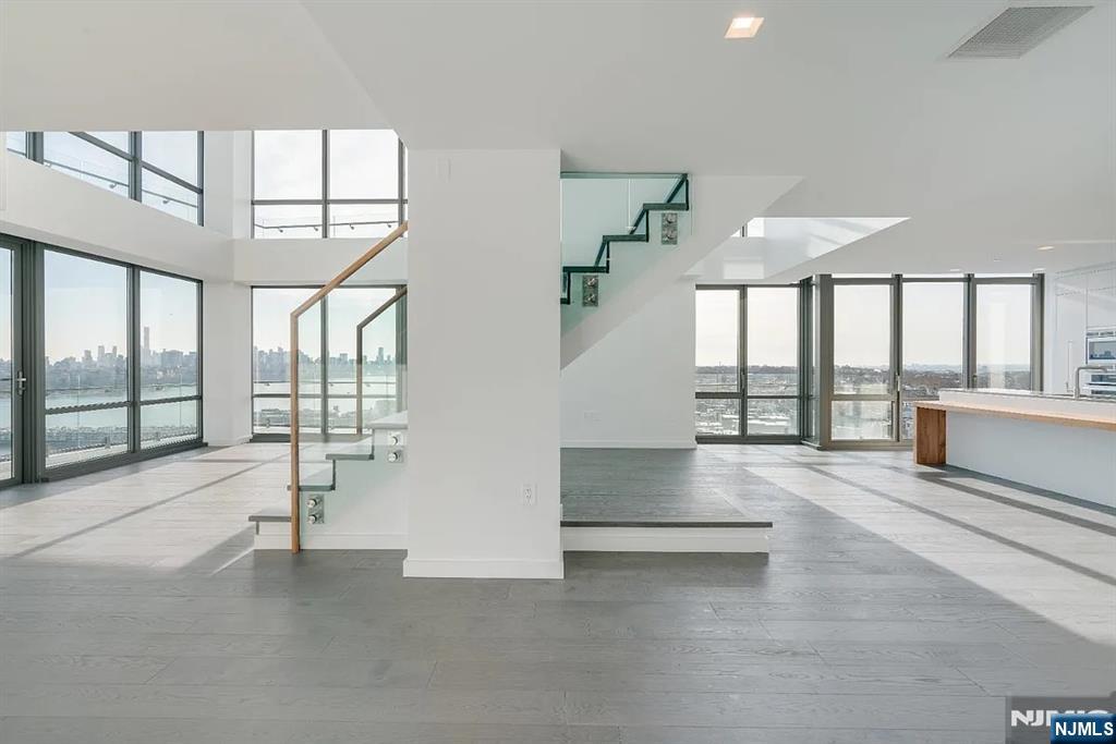 320 Adolphus Avenue, Unit 316 Cliffside Park, NJ 07010 - Photo 3 of 34 a view of an entryway with a floor to ceiling window and an empty room
