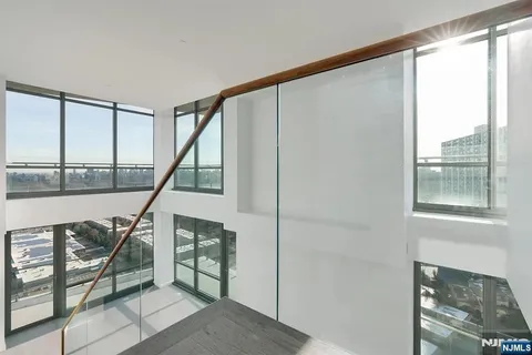 a view of an entryway with hardwood