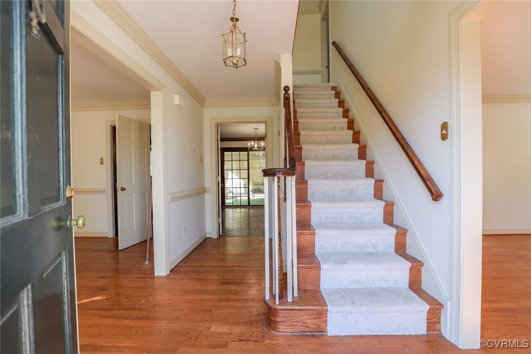 550 Fords Road Manakin-Sabot, VA 23103 - Photo 12 of 45 Entryway featuring a chandelier, wood-type floorin