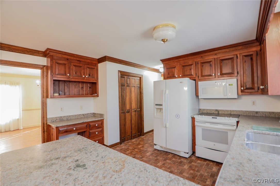 550 Fords Road Manakin-Sabot, VA 23103 - Photo 22 of 45 Kitchen with light stone counters, sink, white app
