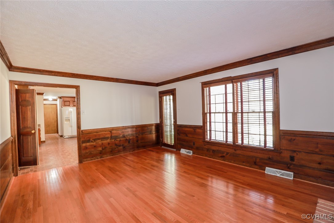 550 Fords Road Manakin-Sabot, VA 23103 - Photo 24 of 45 Empty room featuring wood walls, crown molding, wo