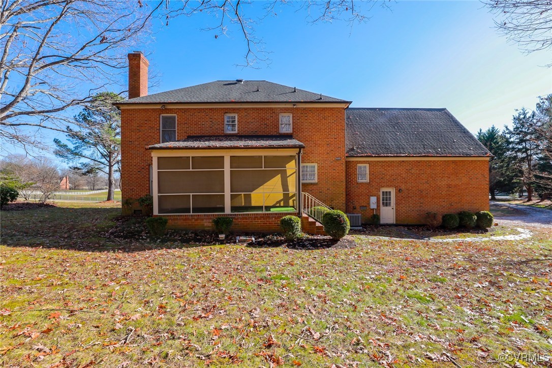 550 Fords Road Manakin-Sabot, VA 23103 - Photo 8 of 45 Back of house featuring a sunroom and central AC u