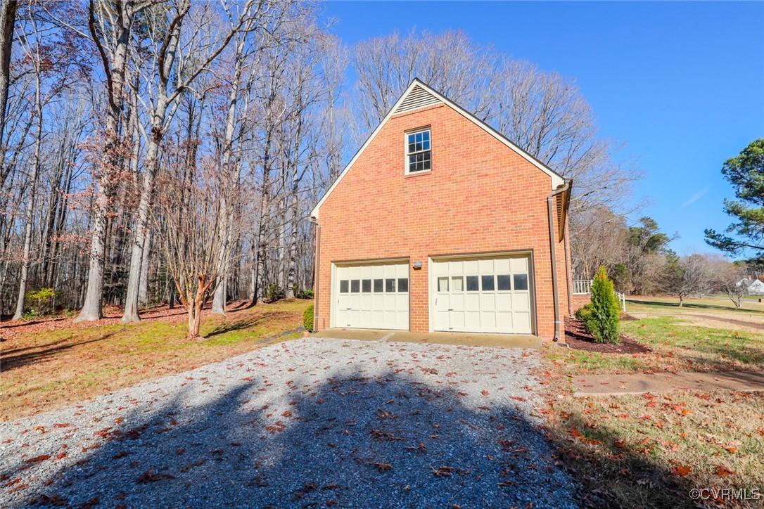 550 Fords Road Manakin-Sabot, VA 23103 - Photo 10 of 45 View of property exterior with a garage