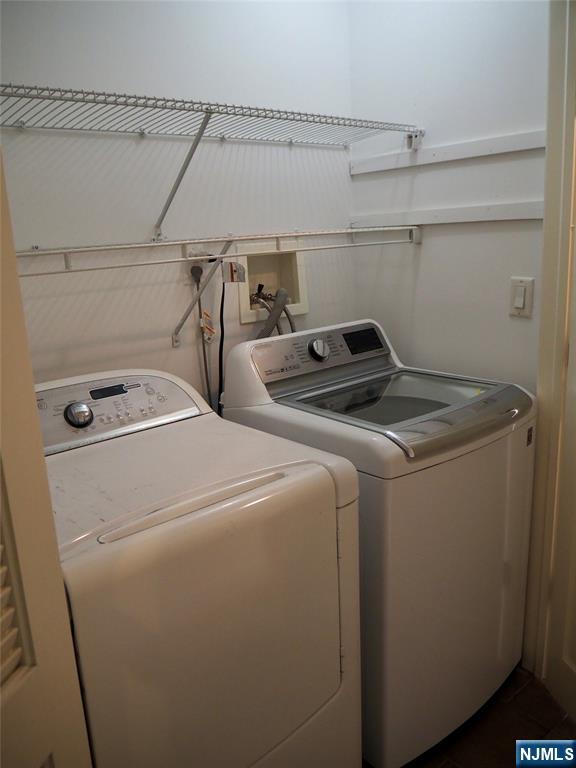 744 Hamilton Avenue, Unit 1 Ridgefield, NJ 07657 - Photo 20 of 29 a utility room with dryer and washer
