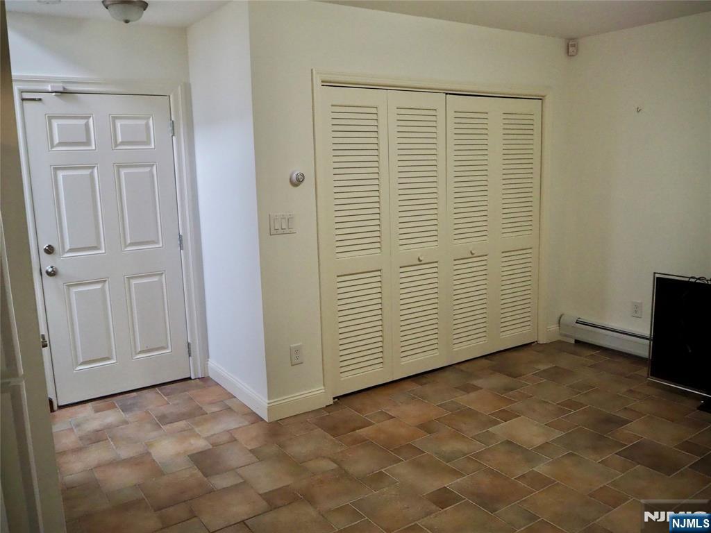 744 Hamilton Avenue, Unit 1 Ridgefield, NJ 07657 - Photo 21 of 29 an empty room with windows