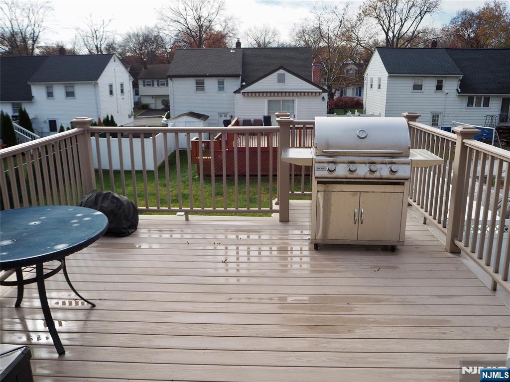 744 Hamilton Avenue, Unit 1 Ridgefield, NJ 07657 - Photo 27 of 29 a view of a deck with furniture