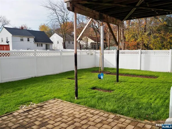 a view of a backyard with garden