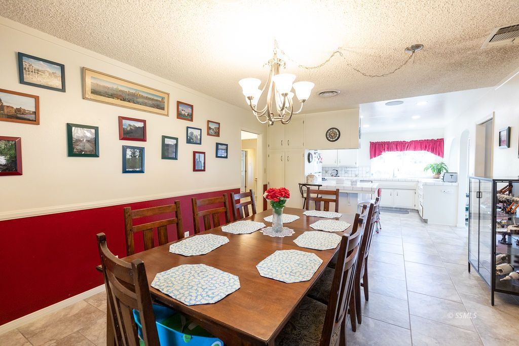 737 Scott Circle Ridgecrest, CA 93555 - Photo 17 of 49 a view of a dining room with furniture