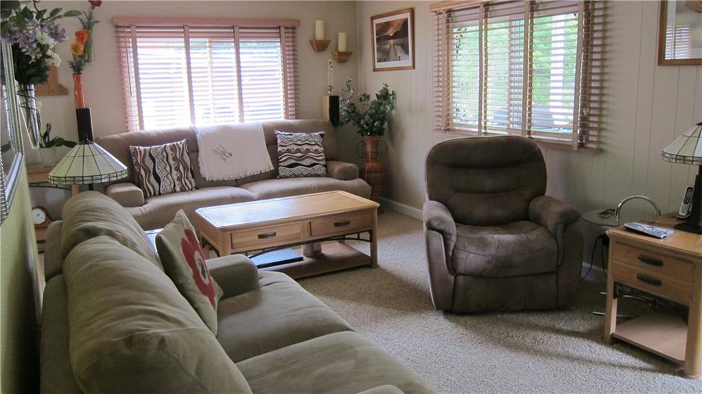 40 Fulton Road Canonsburg, PA 15317 - Photo 7 of 23 Bright and comfy living room. With door leading to nice deck overlooking pool , gazebo and back yard