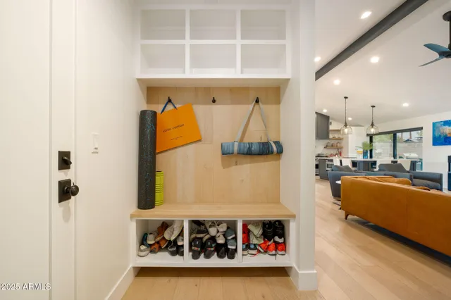 a living room with furniture and a table
