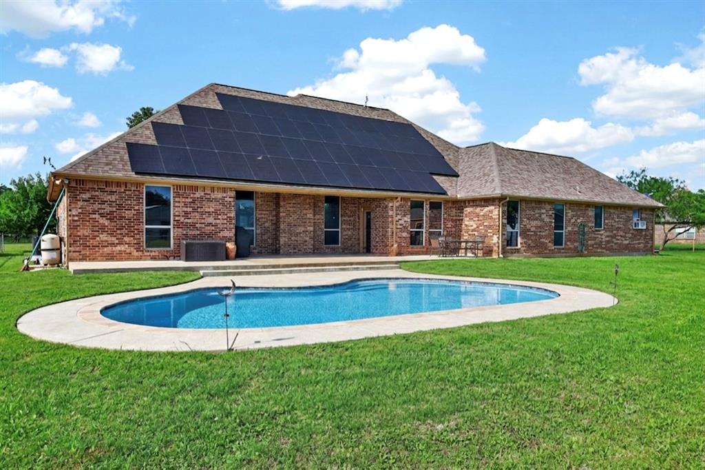 1035 Highland Road Cleburne, TX 76033 - Photo 27 of 36 a view of house with a yard
