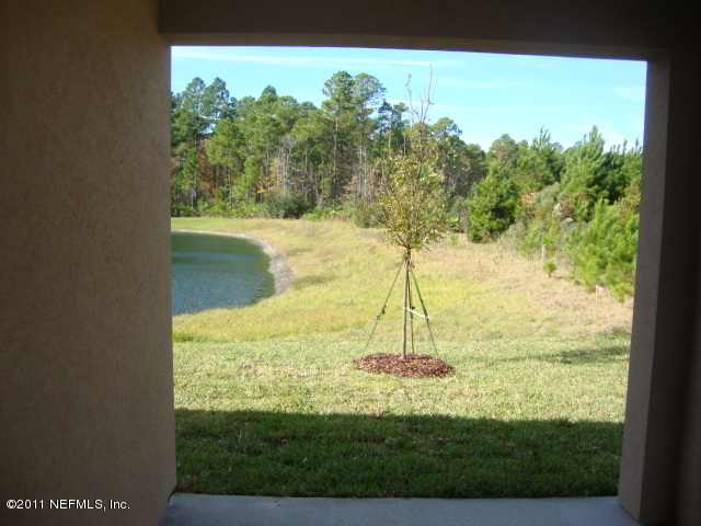 793 Reflection Cove Road East Jacksonville, FL 32218 - Photo 15 of 15 Covered Patio on Pond