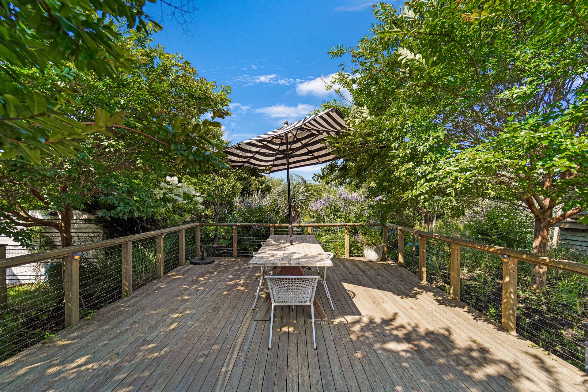 548 Dune Road Westhampton, NY 11978 - Photo 11 of 34 a terrace with trees