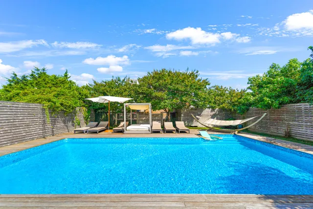 a view of outdoor space swimming pool and outdoor seating