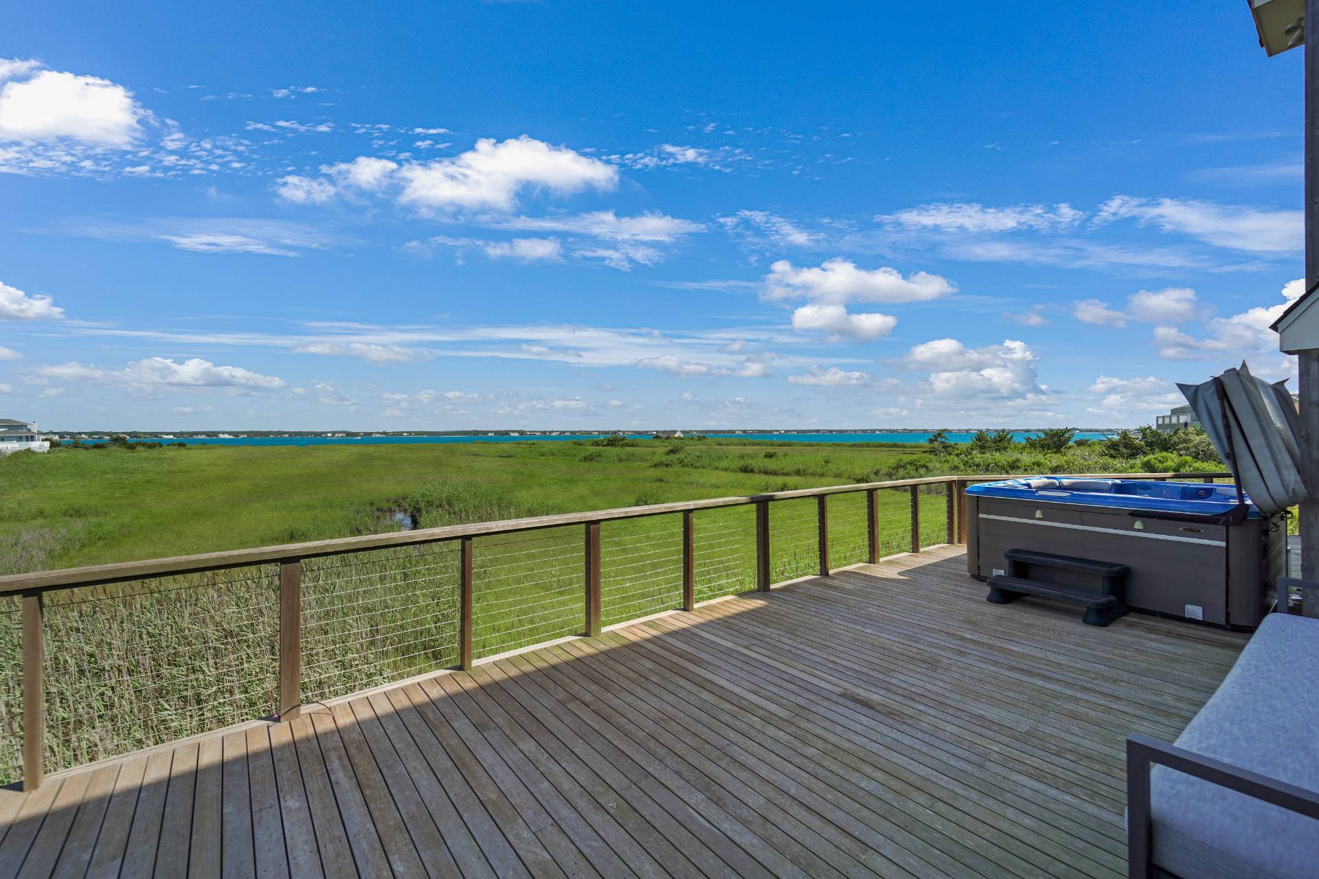 548 Dune Road Westhampton, NY 11978 - Photo 28 of 34 a view of ocean from a balcony