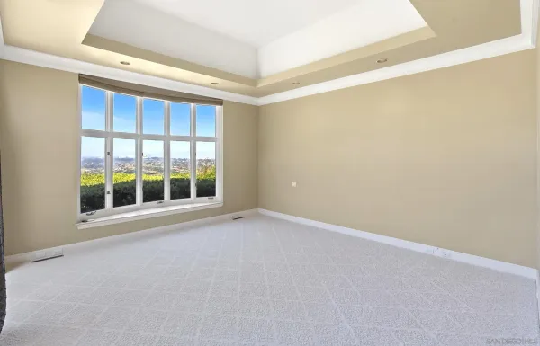 a view of a hallway with windows