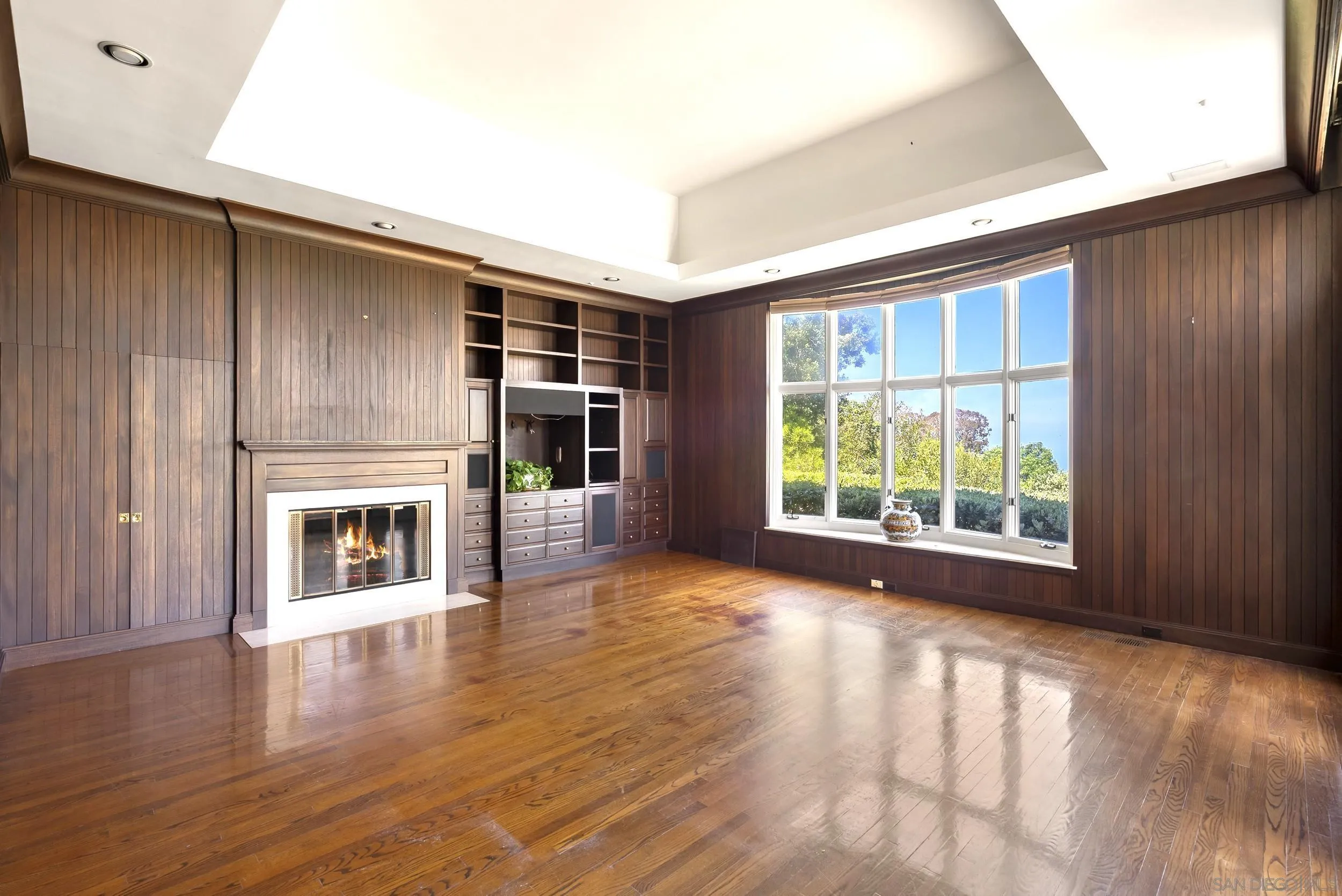 2302 Rue Adriane La Jolla, CA 92037 - Photo 20 of 31 a view of an empty room with wooden floor and a window