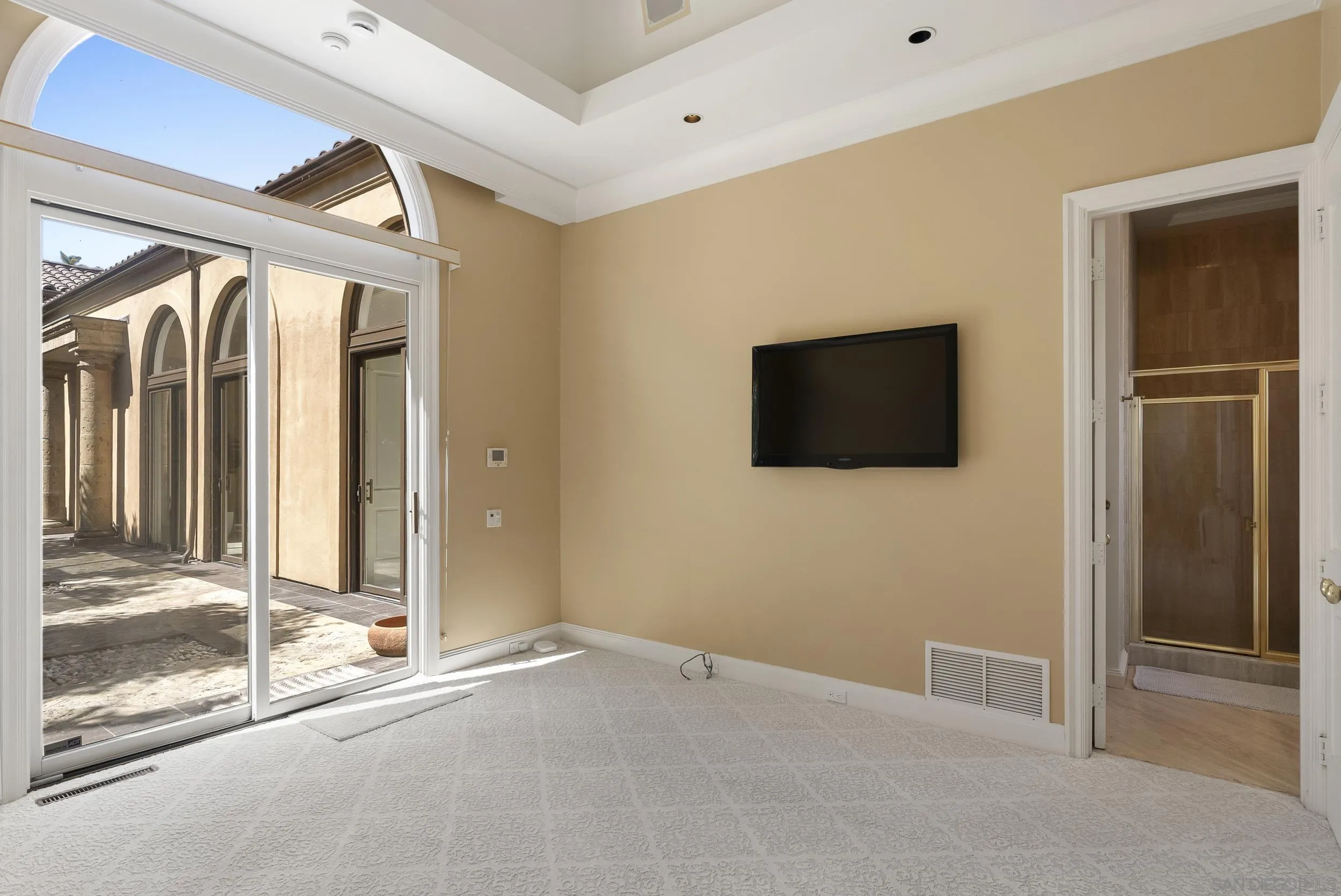 2302 Rue Adriane La Jolla, CA 92037 - Photo 26 of 31 a view of an empty room with wooden floor and a window