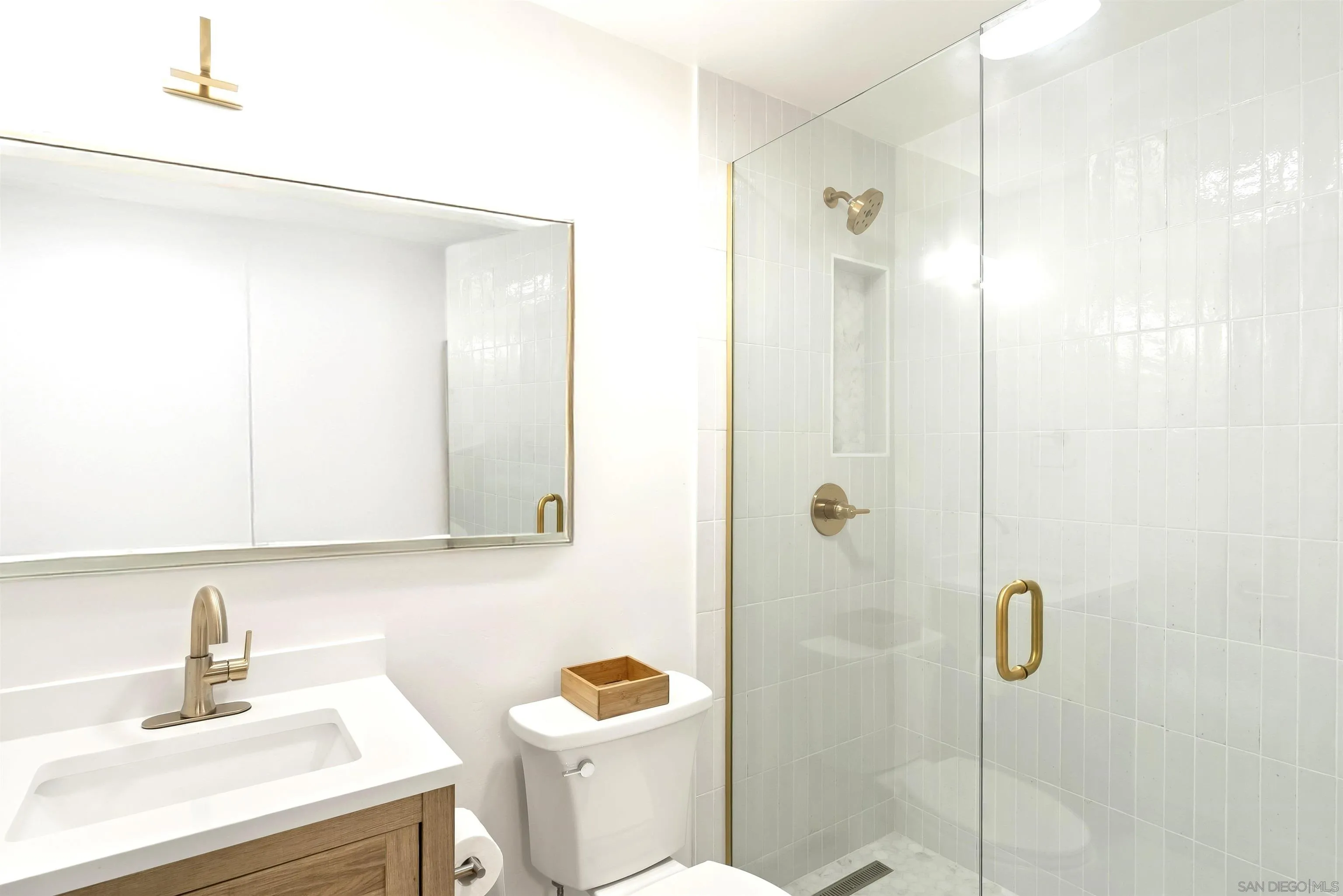 2302 Rue Adriane La Jolla, CA 92037 - Photo 30 of 31 a bathroom with a sink a toilet and shower