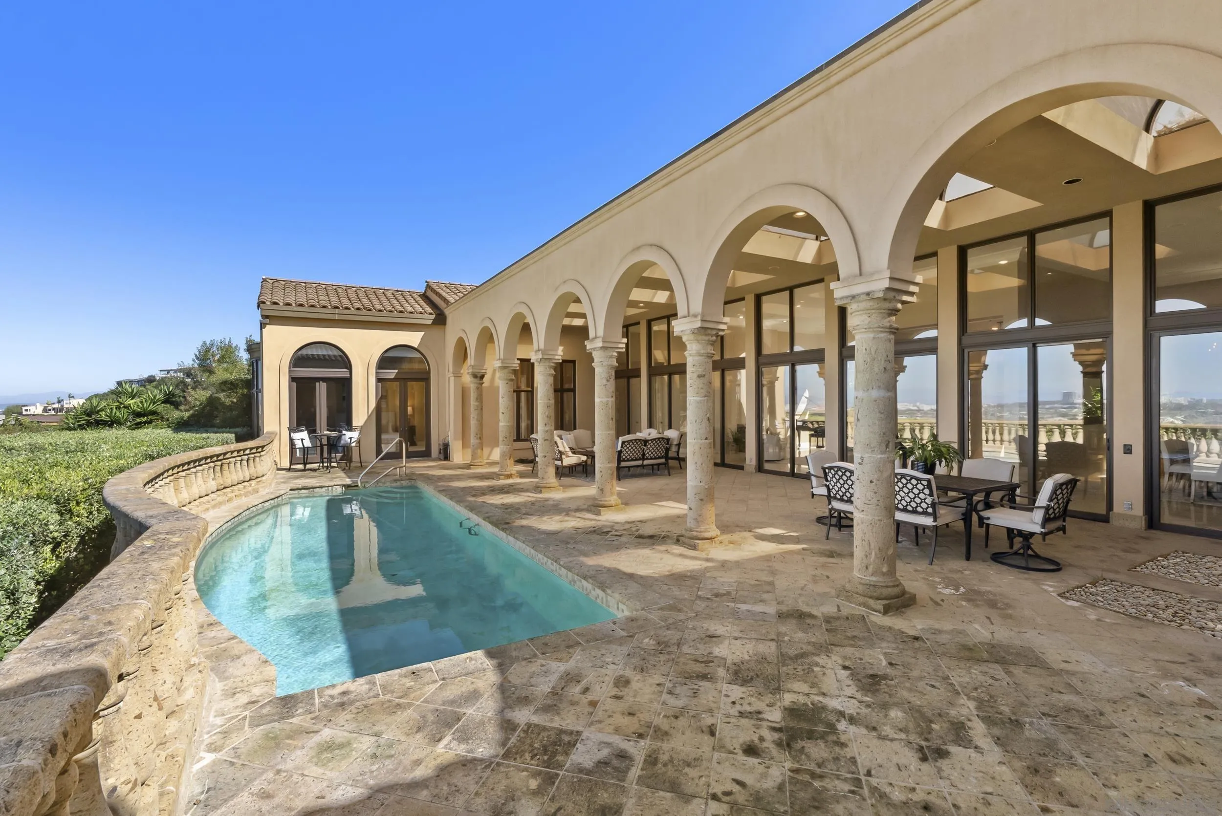 2302 Rue Adriane La Jolla, CA 92037 - Photo 7 of 31 a view of a house with swimming pool and sitting area