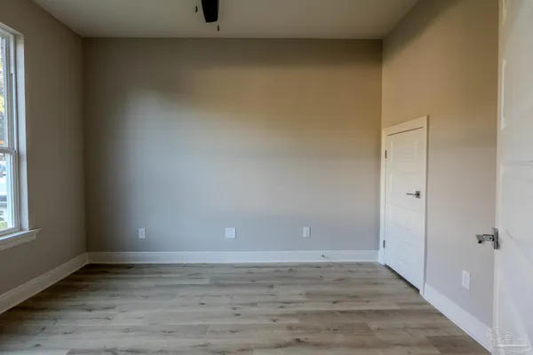 a view of an empty room and window