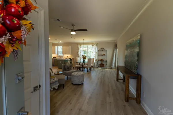 a living room with furniture and a table