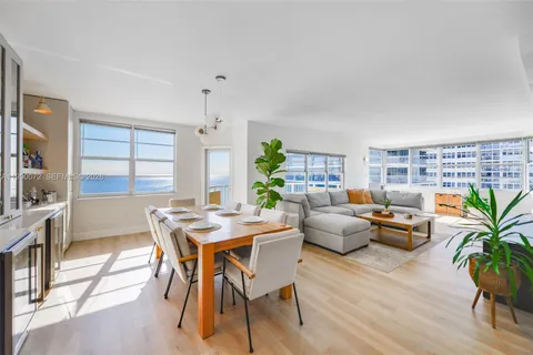 a view of a livingroom with furniture and window
