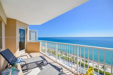 a view of an ocean from a balcony