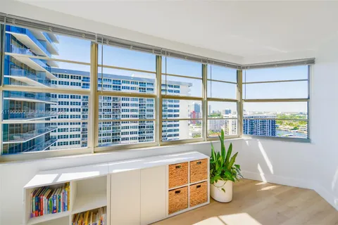 a view of a living room and a window