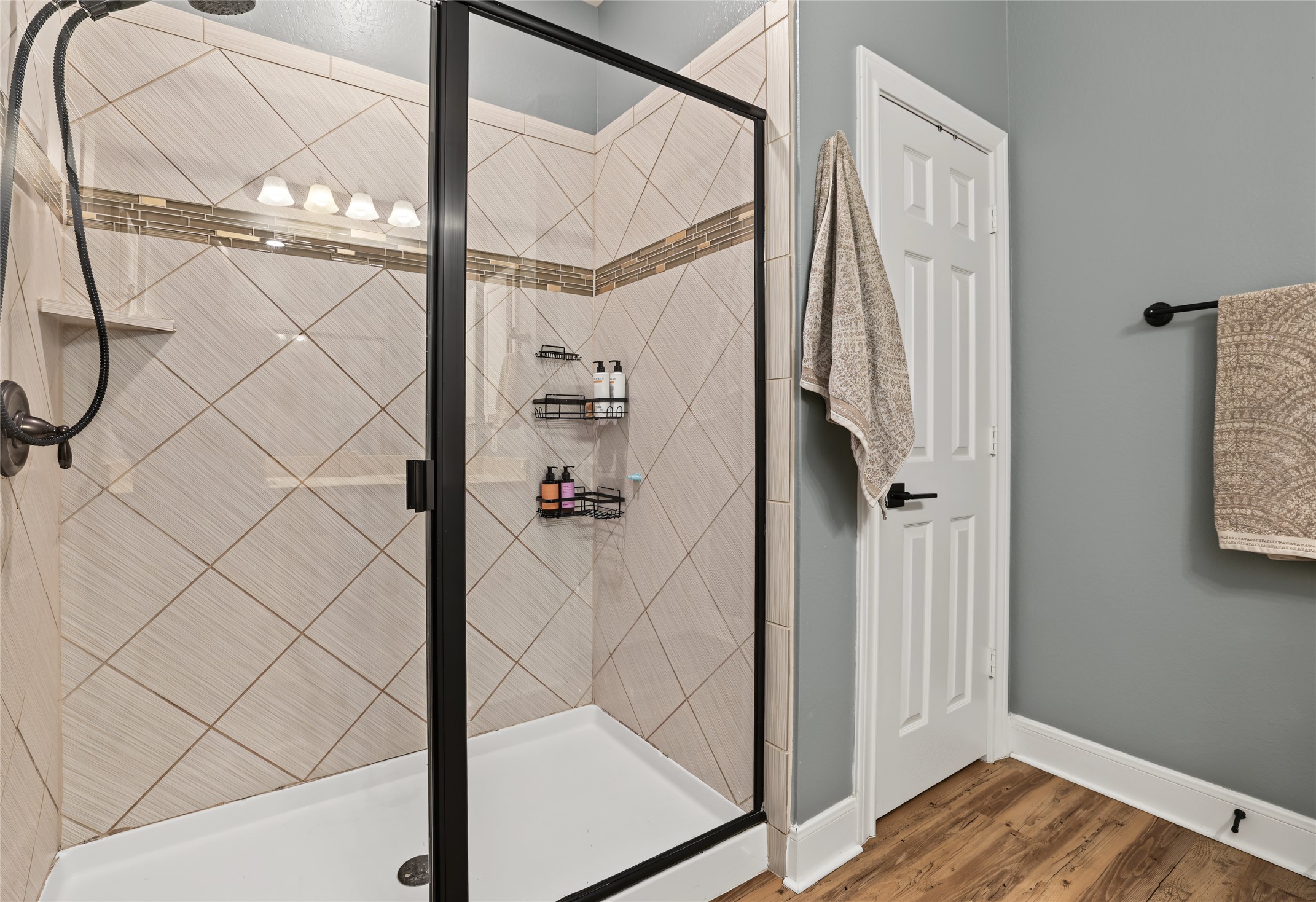 7501 Janes Ranch Road Austin, TX 78744 - Photo 11 of 19 Oversized shower area & separate linen closet.