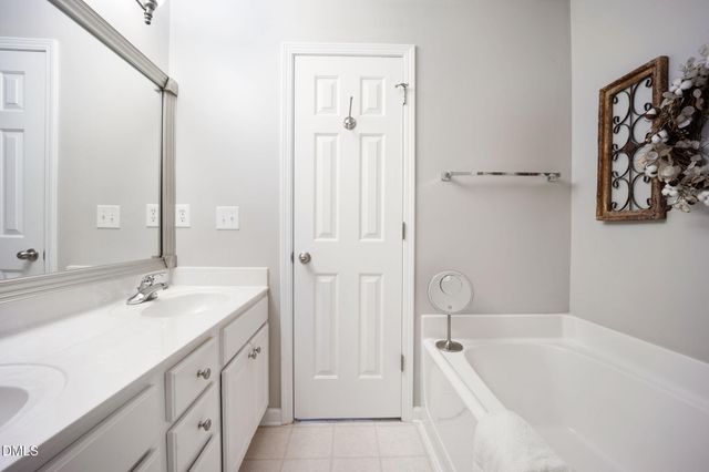 an aerial view of residential houses and outdoor space