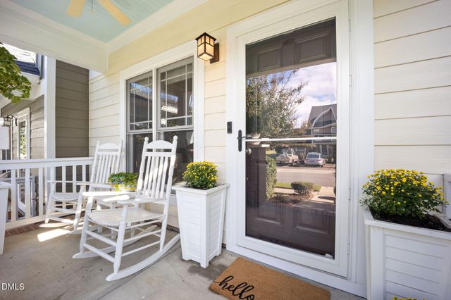 a kitchen with stainless steel appliances granite countertop a refrigerator and a stove