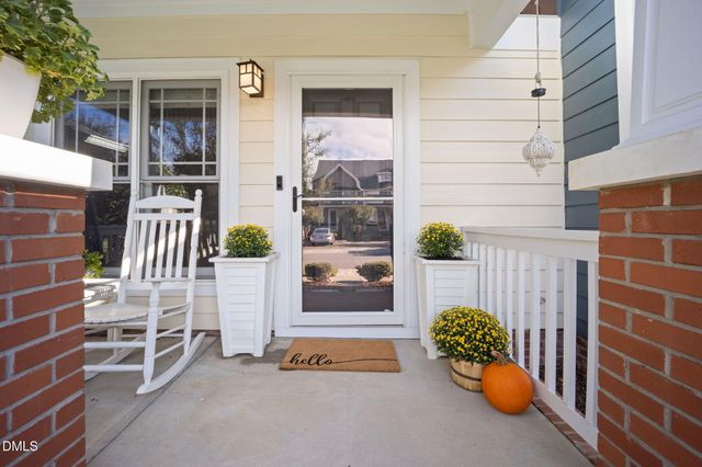 a kitchen with granite countertop stainless steel appliances and wooden cabinets