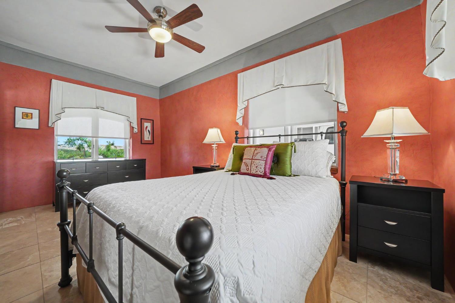 15070 Willow Creek Road Ione, CA 95640 - Photo 54 of 66 a bed room with a bed and a lamp