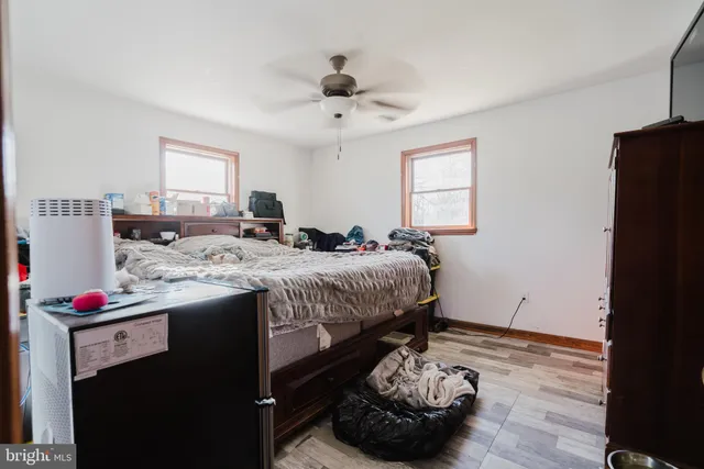 a bed room with a bed and a couch