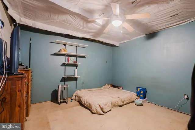 a view of street with parked cars