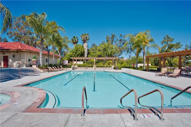 a view of a swimming pool with a patio
