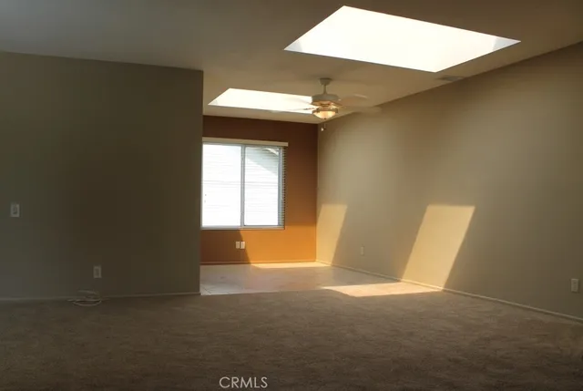 a view of a room with a window