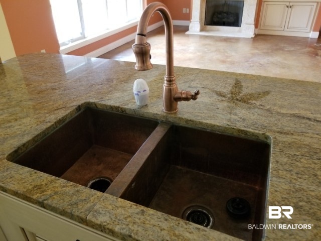 15758 County Road 87 Elberta, AL 36530 - Photo 16 of 50 Kitchen Sink with copper finish faucet.
