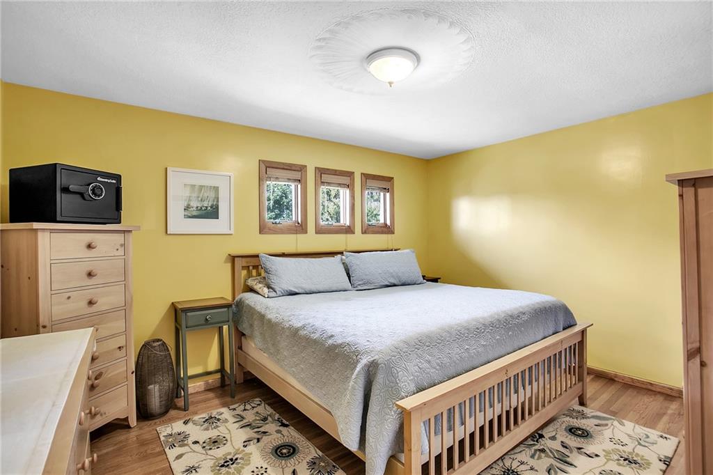 215 Pirich Road Addison, PA 15411 - Photo 14 of 25 a bedroom with a bed and a tv