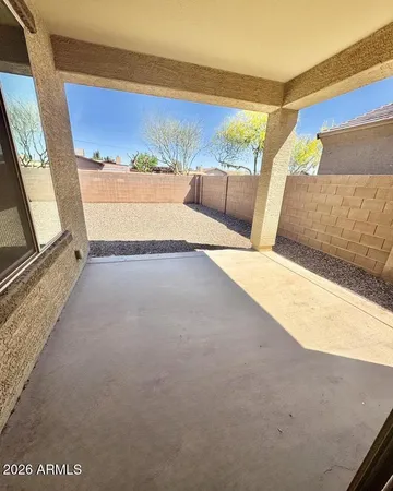 a view of outside space and a yard