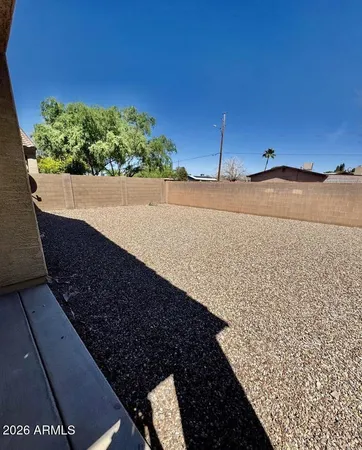 a view of a back yard of the house