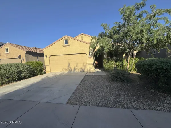 a view of a backyard of the house