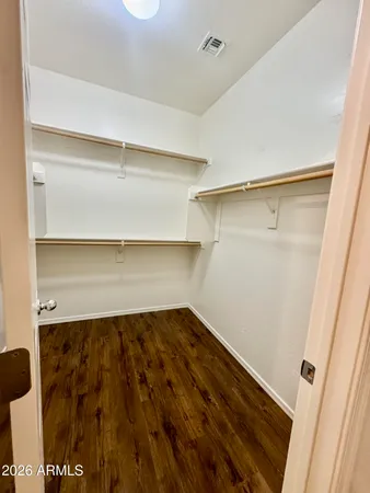 a kitchen with a sink cabinets and stainless steel appliances