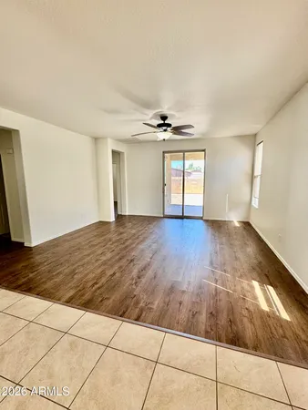 a kitchen with stainless steel appliances granite countertop a refrigerator and a stove