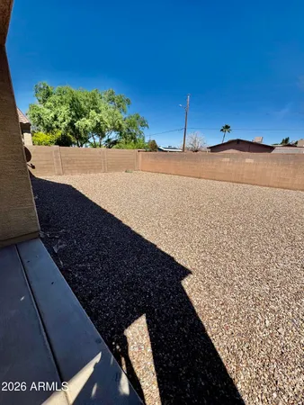 a view of a back yard of the house