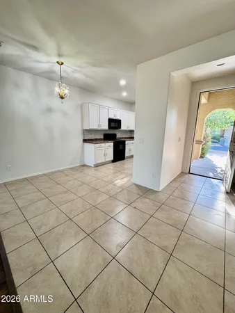 a view of a kitchen with a sink and a stove top oven