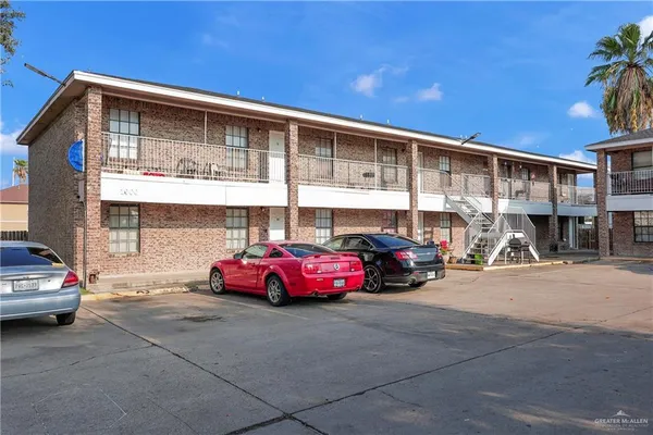 a cars parked in front of a building